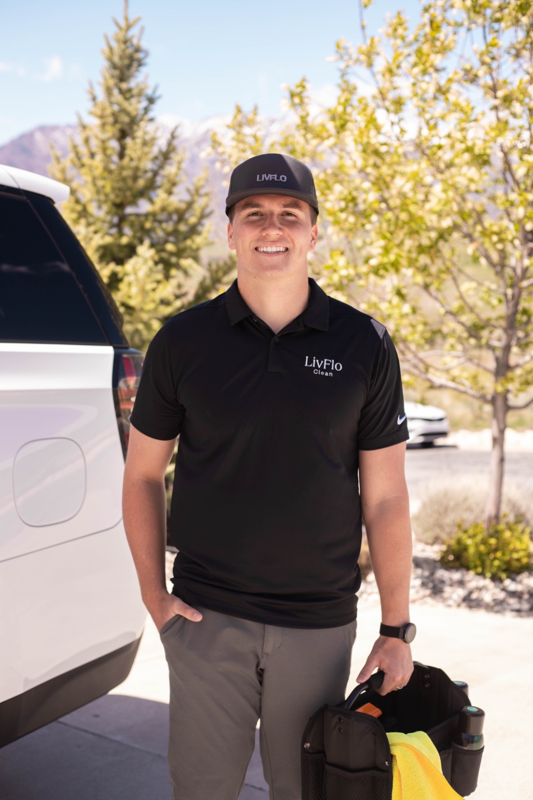 A LivFlo team member with the Wasatch mountains behind them.